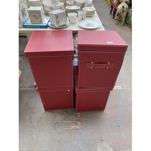 953 - Four leatherette lidded storage boxes