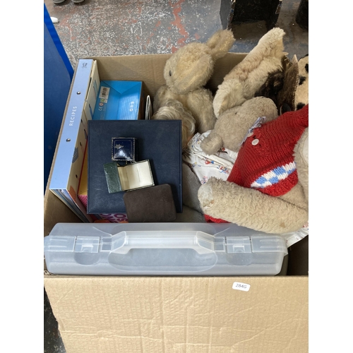 956 - Nine boxes containing soft toys, linen material, Christmas wrapping paper, boxed board games, Space ... 