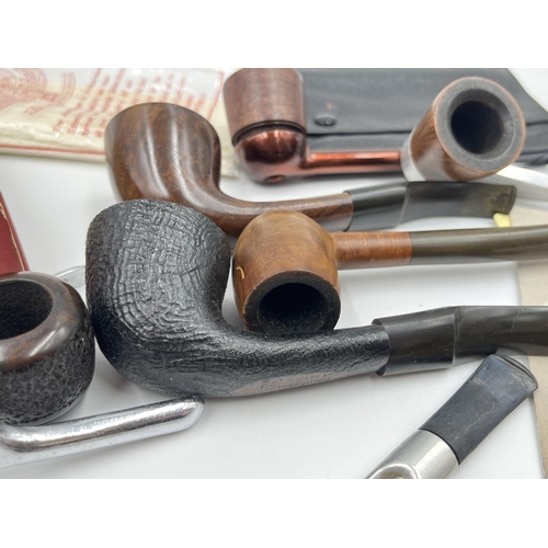 2268 - A collection of smoking pipes to include Polo Piper Briars, Alco Universal, Falcon etc. together wit... 