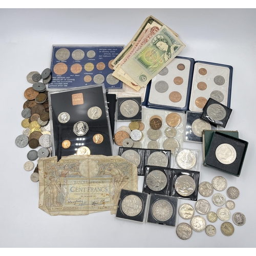 2294 - A collection of worldwide coins and bank notes to include 1876 silver five francs, 1941 United State... 