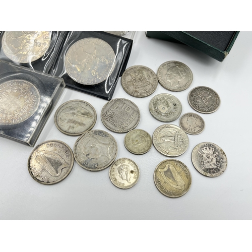 2294 - A collection of worldwide coins and bank notes to include 1876 silver five francs, 1941 United State... 