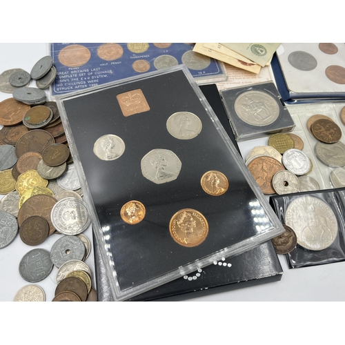 2294 - A collection of worldwide coins and bank notes to include 1876 silver five francs, 1941 United State... 