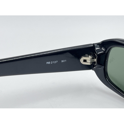 2295 - A cased pair of Ray-Ban RB2127 sunglasses