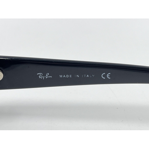 2295 - A cased pair of Ray-Ban RB2127 sunglasses