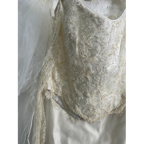 423 - A Justine Mireil size 16 wedding dress purchased from The Bridal House of Chester