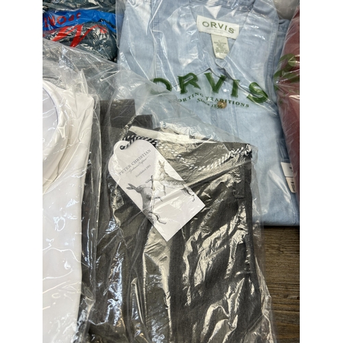 461 - A collection of clothing to include Charles Tyrwhitt size large sky blue short sleeve pique polo, Or... 