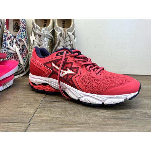 463 - A collection of footwear to include two pairs of Nike Airmax size 5 trainers, pair of Mizuno Wave Ul... 