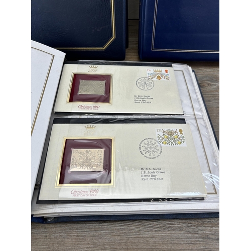 469 - Three First Day cover albums, two The Queen's Golden Jubilee and one 22ct Golden Replicas of British... 