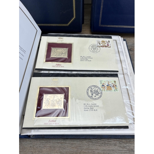 469 - Three First Day cover albums, two The Queen's Golden Jubilee and one 22ct Golden Replicas of British... 