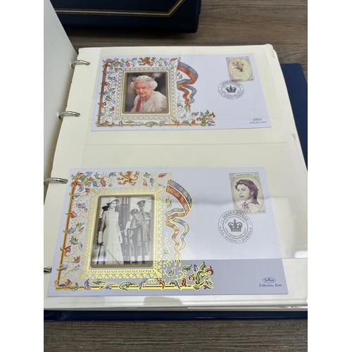 469 - Three First Day cover albums, two The Queen's Golden Jubilee and one 22ct Golden Replicas of British... 