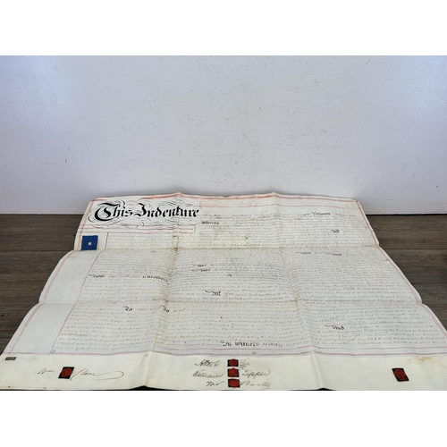 470 - Three 19th century items, one indenture dated 4th January 1868, one Holy Bible and one Bunyan's Pilg... 