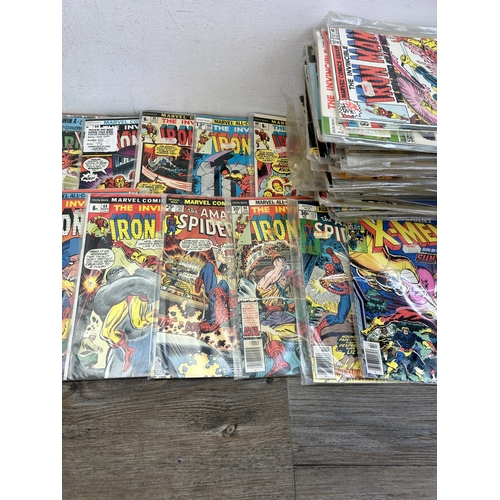 475 - A collection of vintage Marvel comics to include The Invincible Iron Man, Daredevil, The Incredible ... 