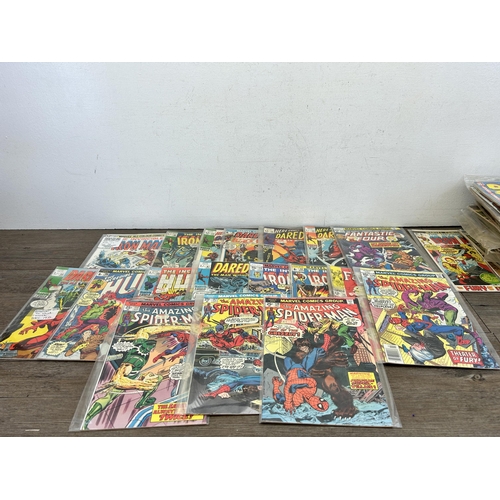 475 - A collection of vintage Marvel comics to include The Invincible Iron Man, Daredevil, The Incredible ... 