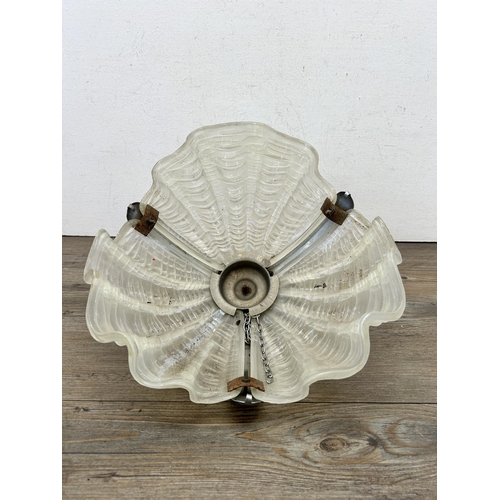 495 - An Art Deco opaque glass and chrome plated clam shell ceiling light shade - approx. 34cm diameter