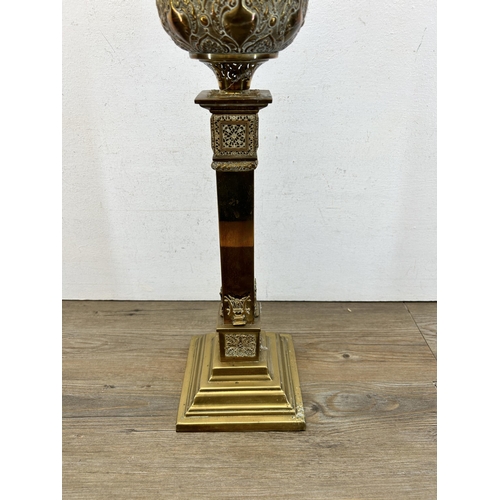 501 - A 19th century ornate brass oil lamp on stepped base - approx. 62cm high