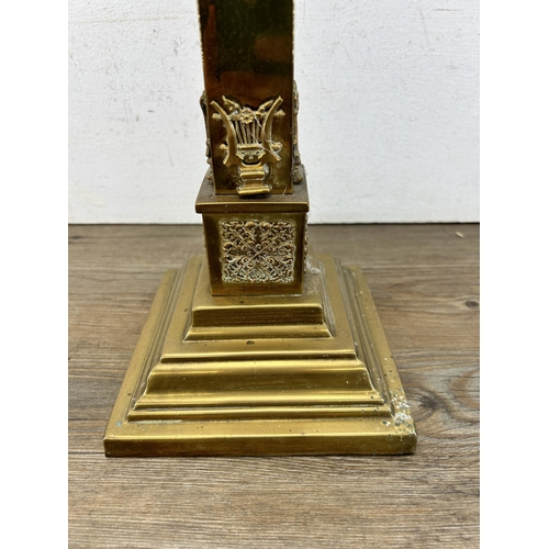 501 - A 19th century ornate brass oil lamp on stepped base - approx. 62cm high