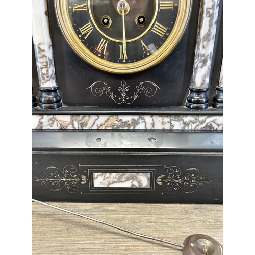 512 - A Victorian black slate and marble chiming mantel clock with pendulum - approx. 42cm high x 44cm wid... 