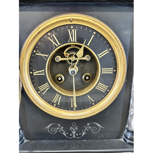 512 - A Victorian black slate and marble chiming mantel clock with pendulum - approx. 42cm high x 44cm wid... 