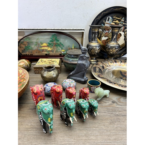 520 - A collection of items to include carved hardwood elephant figurine, boxed Chinese red lacquered case... 