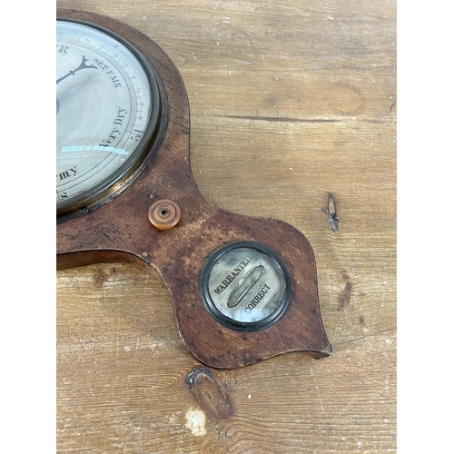 534 - An early 19th century mahogany cased barometer - approx. 95cm high