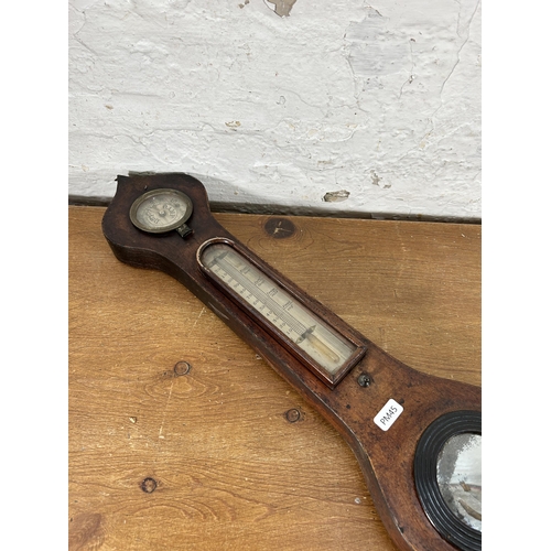 534 - An early 19th century mahogany cased barometer - approx. 95cm high