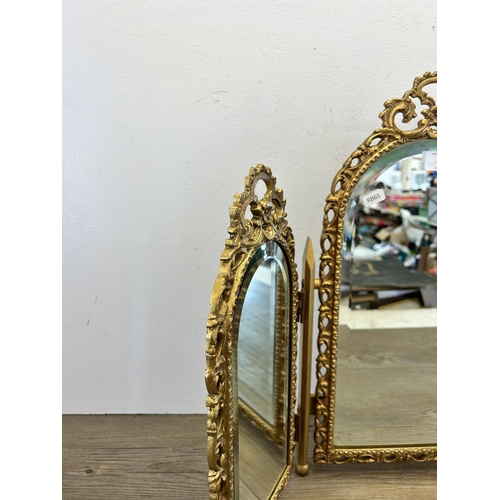 536 - A mid 20th century gilt framed bevelled edge triptych dressing table mirror - approx. 49cm high x 67... 