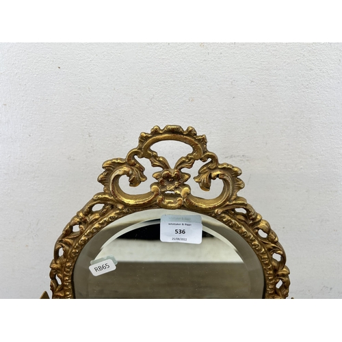 536 - A mid 20th century gilt framed bevelled edge triptych dressing table mirror - approx. 49cm high x 67... 