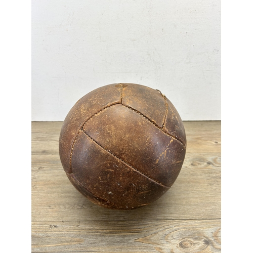 538 - A mid 20th century brown leather football