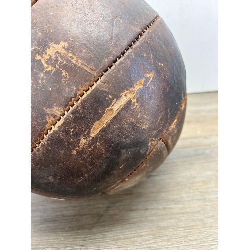 538 - A mid 20th century brown leather football