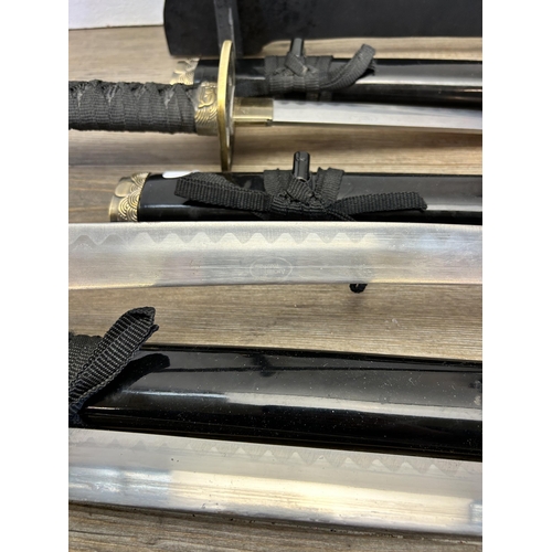 541 - An Ancient Warrior ornamental samurai sword set