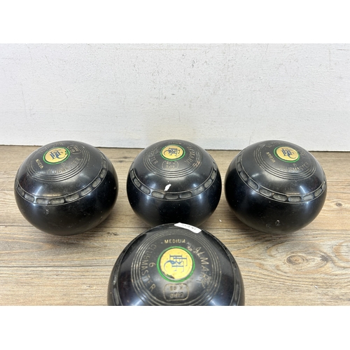 543 - A set of four Almark Clubmaster medium 6 crown green bowls