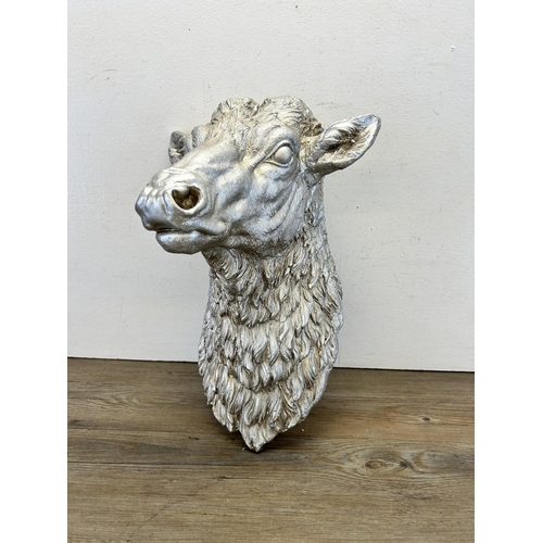 550 - A silver painted cow head wall plaque - approx. 46cm high