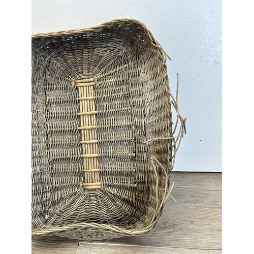 551 - An early 20th century Flemish wicker market basket