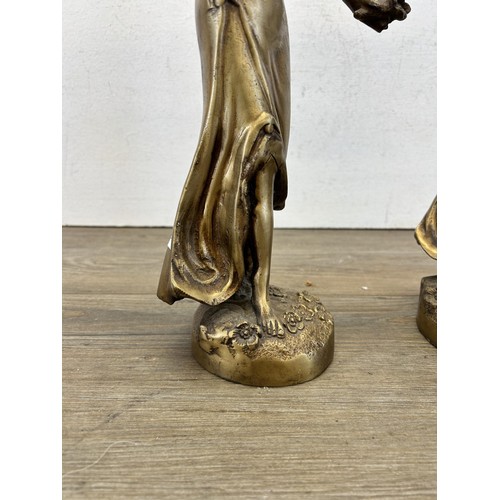 531 - Two gilt metal lady figurines after Charles Ruchot - approx. 37cm high