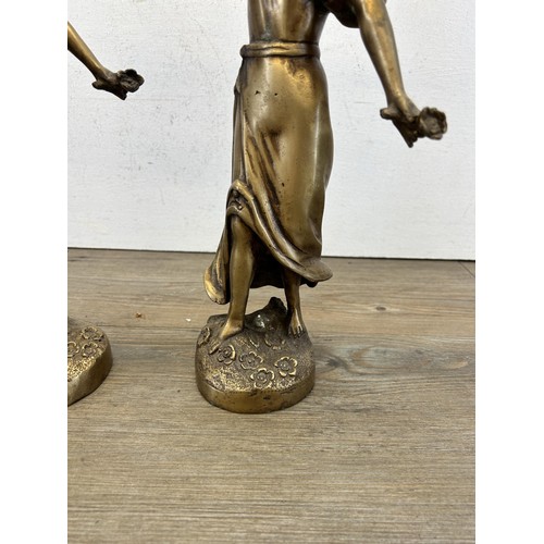 531 - Two gilt metal lady figurines after Charles Ruchot - approx. 37cm high