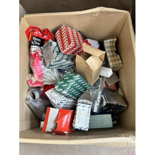 897 - Five boxes containing clothing, boxed Stikatak knee kicker, sand paper, O rings etc.