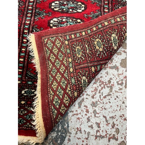 487 - Two mid 20th century Middle Eastern prayer mats/rugs, one 85cm x 64cm and one 90cm x 62cm