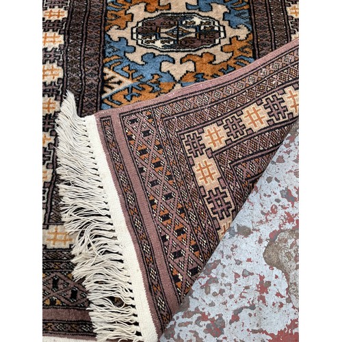 487 - Two mid 20th century Middle Eastern prayer mats/rugs, one 85cm x 64cm and one 90cm x 62cm