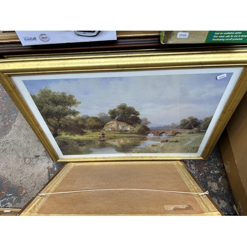 921 - A collection of house clearance items to include boxed Parasene greenhouse heater, framed pictures a... 