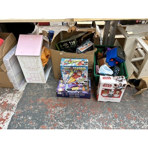 923 - Two boxes and one doll's house containing toys and games to include Space Jam Super Shoot & Dunk set... 