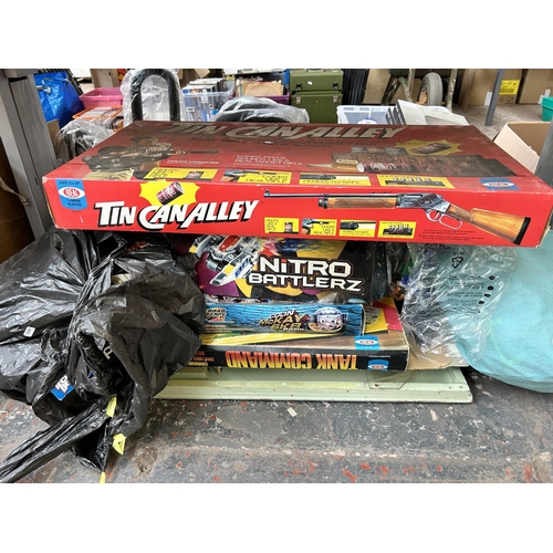 930 - A large collection of vintage and modern toys and games to include boxed Ideal tin can alley, boxed ... 