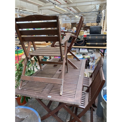 874 - A Rowlinson Garden Products Limited five piece garden table and chair set comprising four chairs and... 