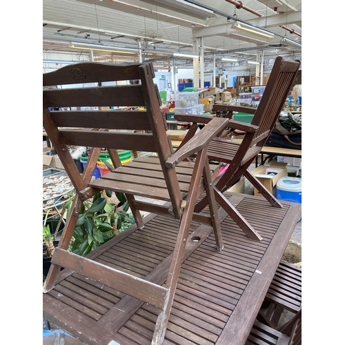 874 - A Rowlinson Garden Products Limited five piece garden table and chair set comprising four chairs and... 