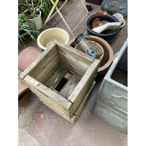 886 - A large collection of garden planters to include pair of Rowlinson Garden Products wooden, glazed te... 