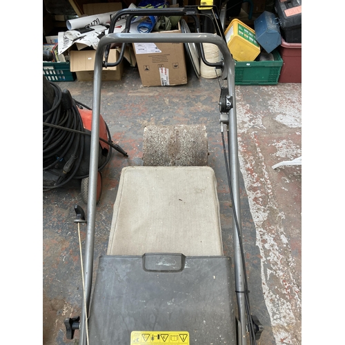 889 - A Honda HRB476C petrol lawn mower