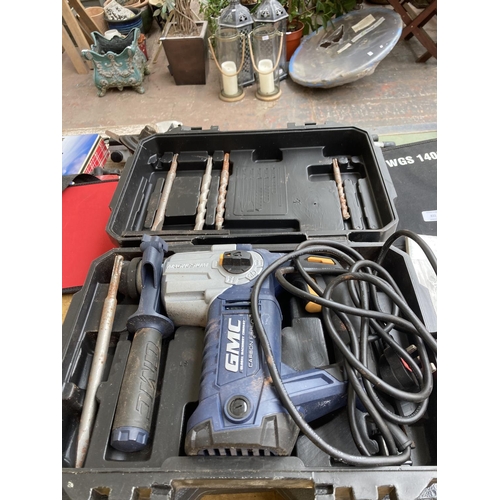 833 - Three cased 240v power tools, one GMC rotary hammer drill, one Power Plus hammer drill and one Mac A... 