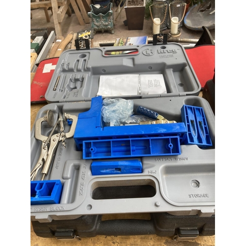 835 - Two cased items, one Kreg pocket hole system and one Bostitch rivet gun