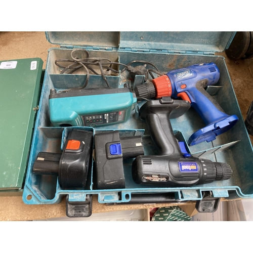 838 - A collection of boxed handheld power tools to include Draper cordless power drill with battery, Rols... 