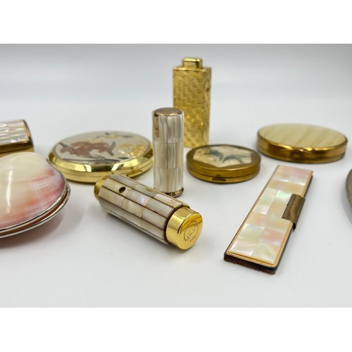 453 - Ten vanity items to include compacts, lipstick holders etc.