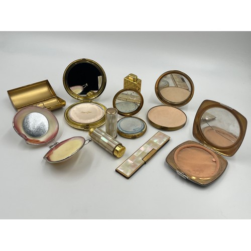 453 - Ten vanity items to include compacts, lipstick holders etc.